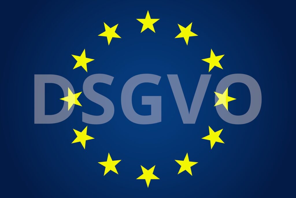 GDPR data protection trends 2023: a blue background with yellow stars and the word GDPR